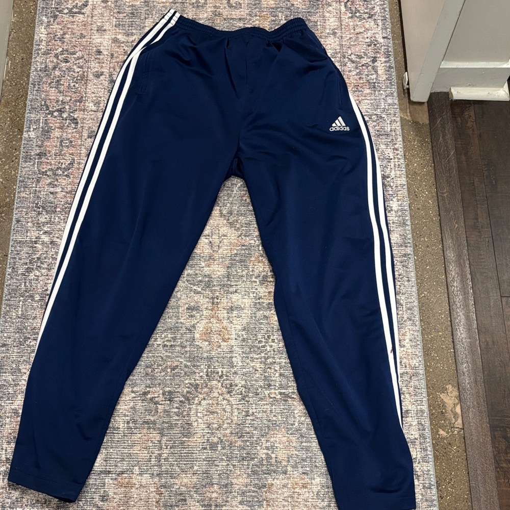 Vintage Adidas snap on track pants. Navy and white. Size L